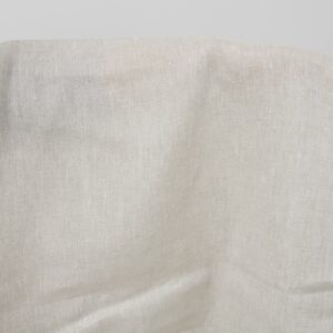 Plain linen fabric in light grey close up detail