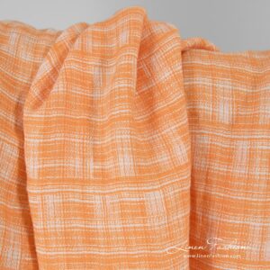 Orange jacquard linen fabric, specially washed to increase softness