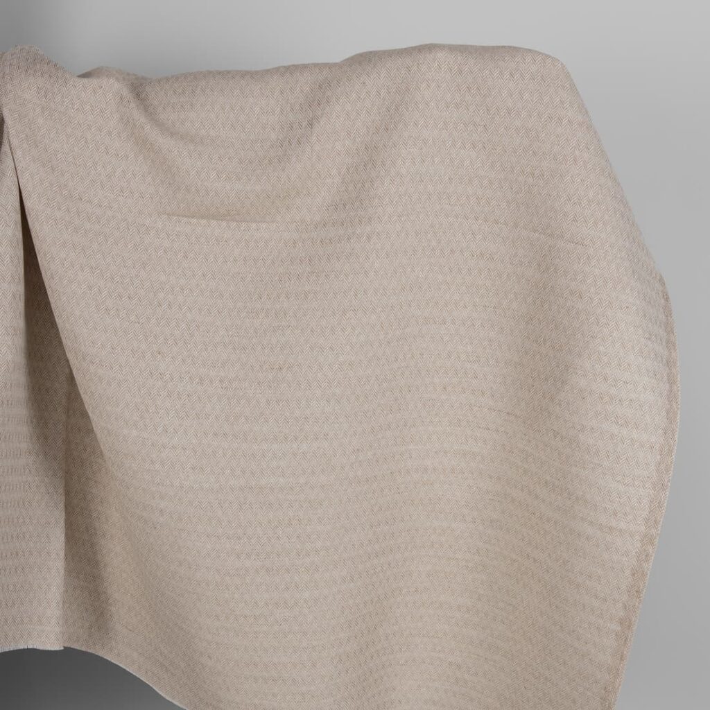 Brown and white linen cotton fabric in a herringbone pattern