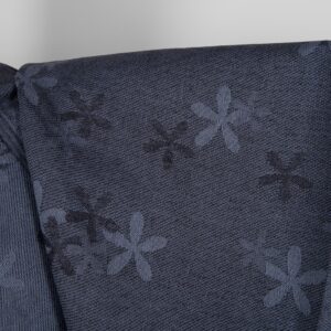 Linen cotton fabric greyish-blue with flowers close up detail