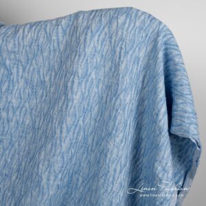 Blue jacquard linen fabric in wavy pattern