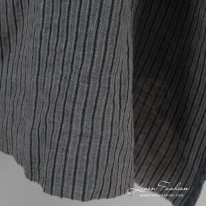 Linen jacquard fabric in black stripes, specially washed to increase softness
