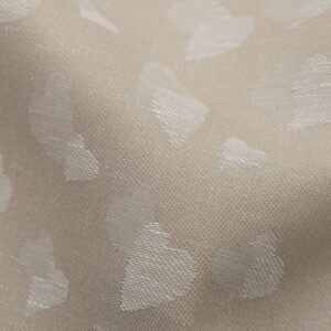 Lys brunt halvlinstoff med små hjerter