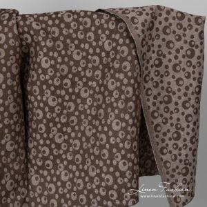 Brown linen cotton fabric with bubbles.