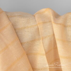 Gult lin-bomullsstoff i striper