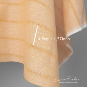 Gult lin-bomullsstoff i striper