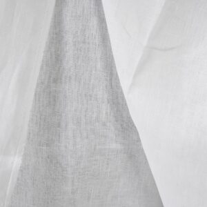 Heavy linen fabric bright white colour close up edge