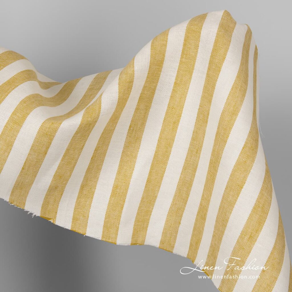 Thick linen fabric in mustard yellow off white stripes.