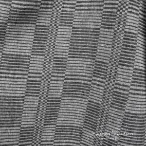 Svart og hvitt linstoff i striper