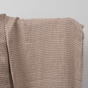 Linen grey fabric with red checks washed
