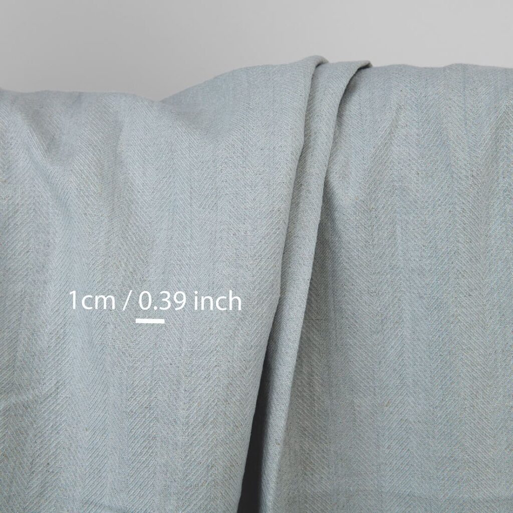 Vasket grønnlig grått linstoff 2 Grey green linen fabric, herringbone