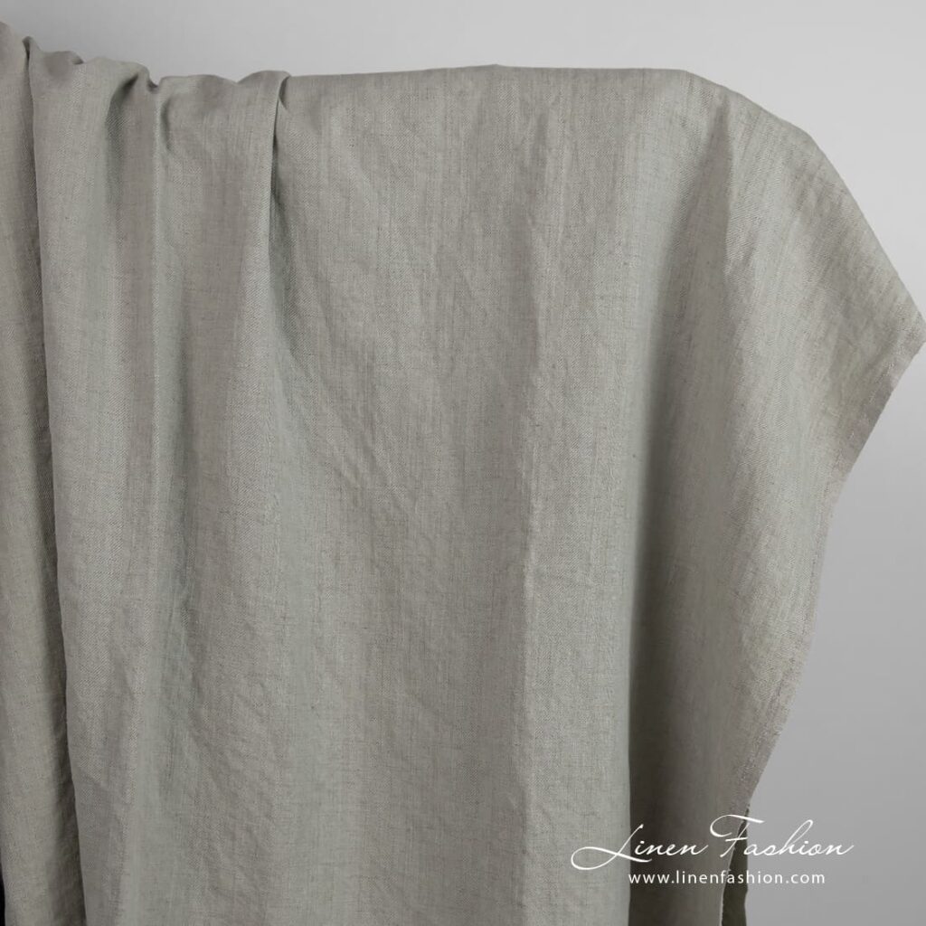 Linen cotton fabric in old green color, washed