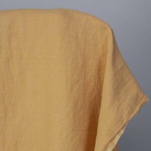 Washed linen cotton fabric in yellow-sand small pattern 145cm