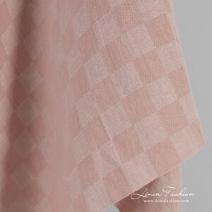 Pink linen cotton fabric in checks, specially washed to increase softness