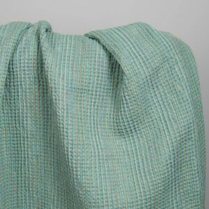 Washed green linen cotton waffle weave fabric