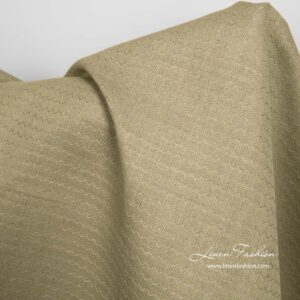 Grønt lin-bomullsstoff i bølgemønster