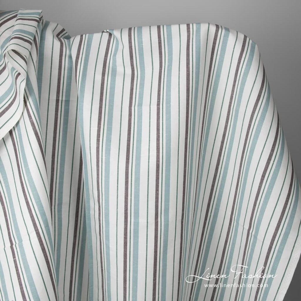White fabric with blue, green and brown stripes