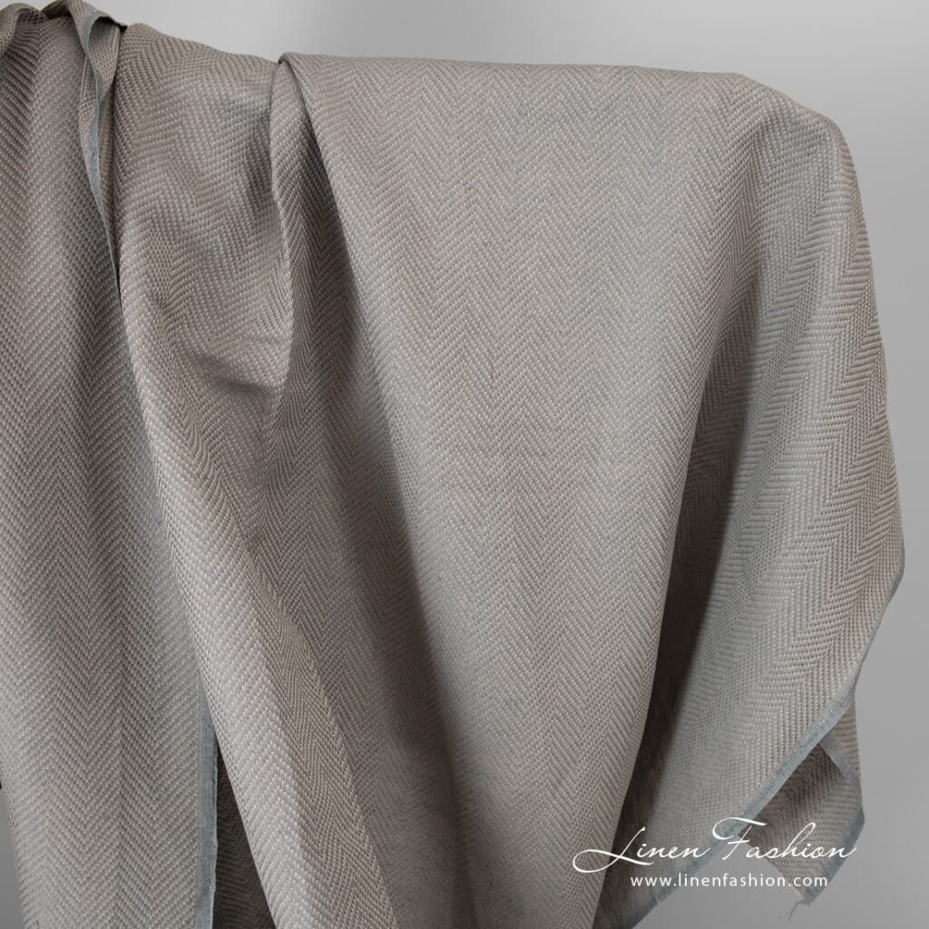 Grey linen cotton fabric in herringbone.