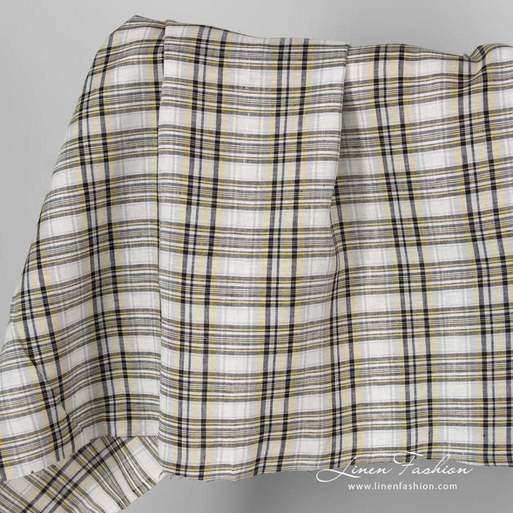 Linen fabric in black yellow checks.