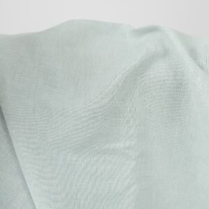Wide linen cotton fabric pale turquoise colour close up view
