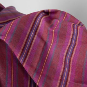 Linen cotton fabric in different shade red stripes close up detail