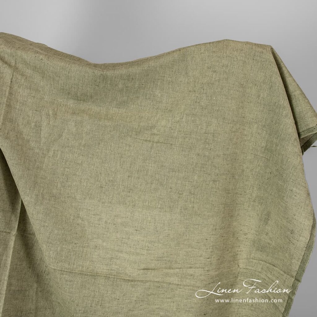 Linen cotton fabric in olive green melange.