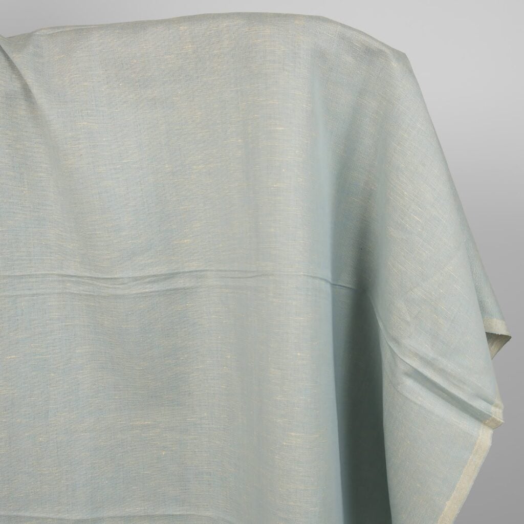 Lin-bomullsstoff lyseblå og kremfarget melange 1 Lin-bomullsstoff lyseblå og kremfarget melange