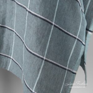 Linen fabric in green color.