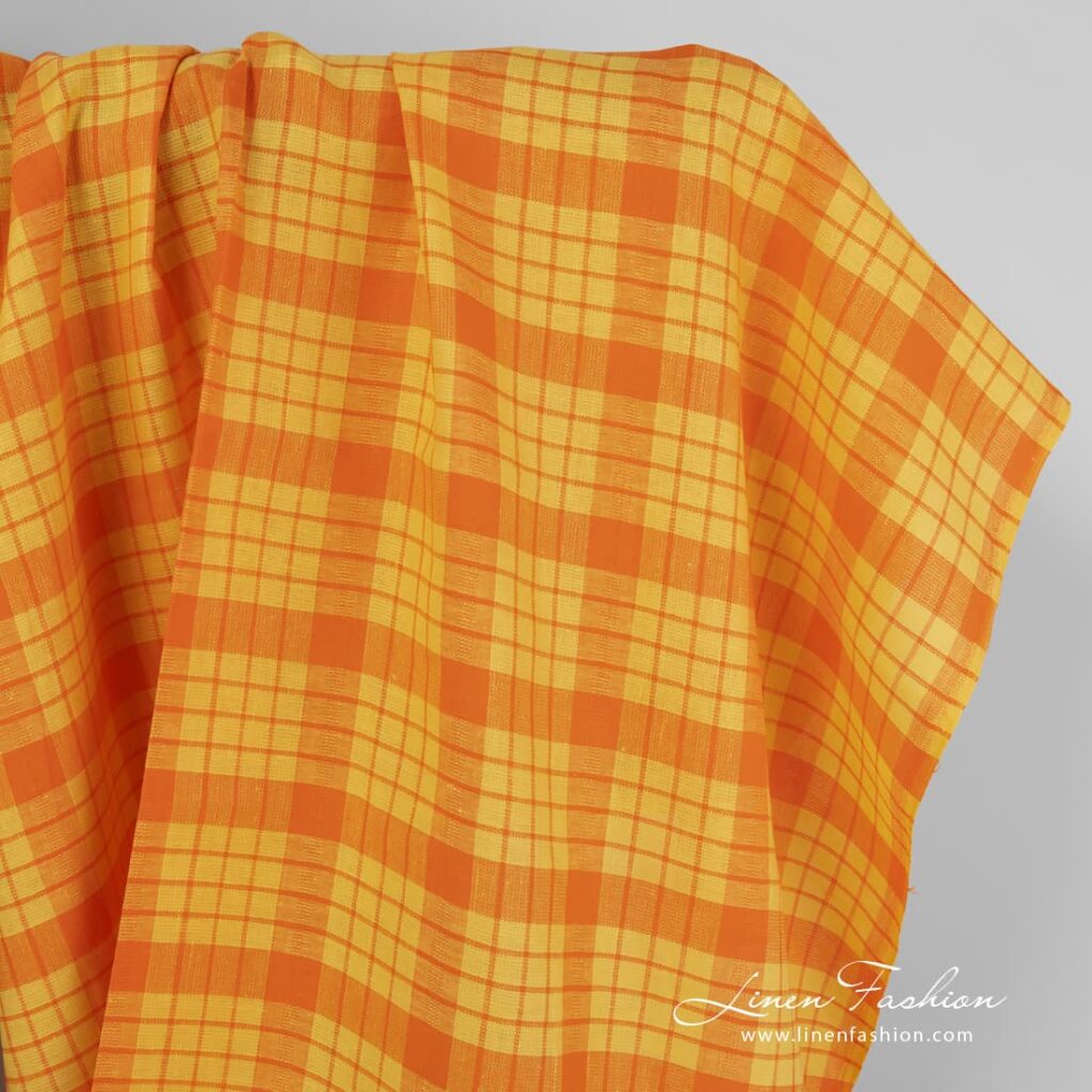 Linen fabric in yellow and orange checks.