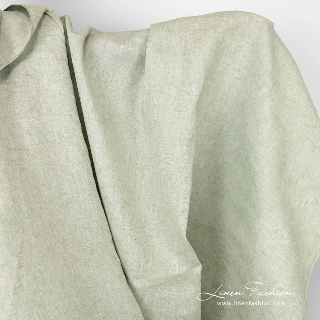 Grønnaktig bredt linstoff 1 Greenish linen fabric