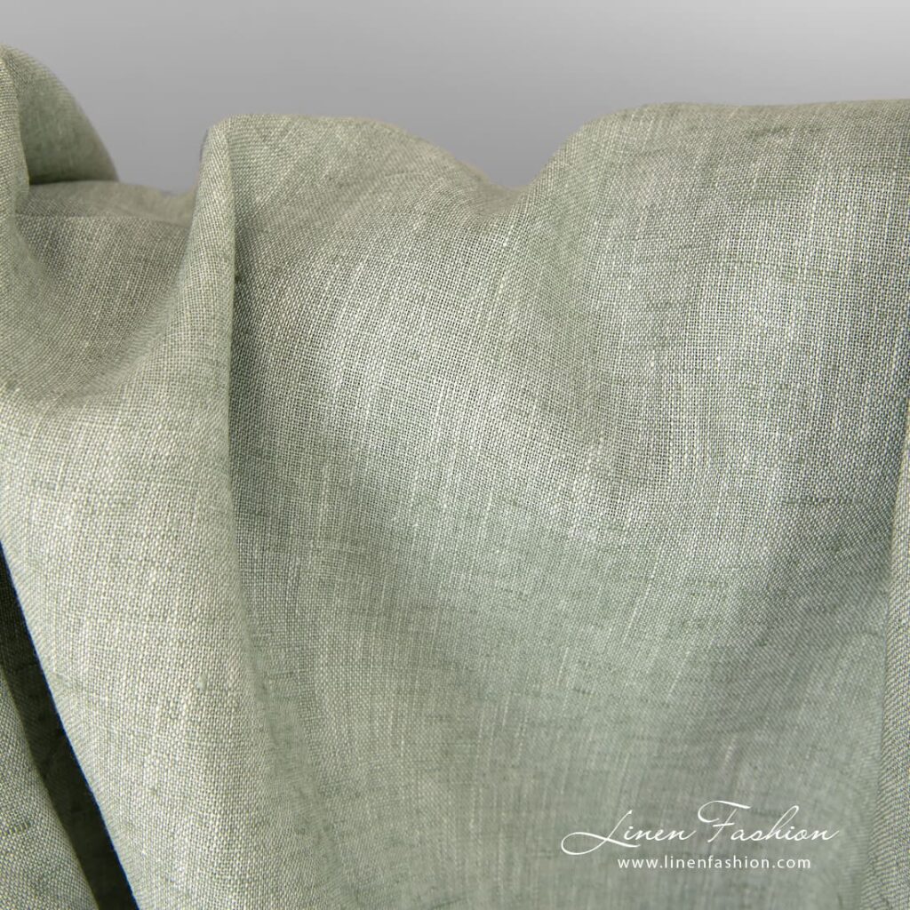 Grønnaktig bredt linstoff 2 Greenish linen wide fabric