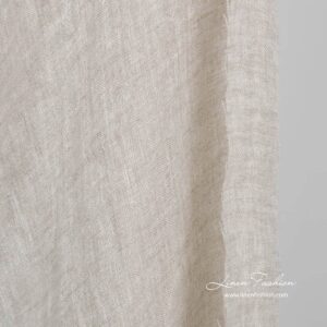 Vasket gjennomsiktig lysegrått linstoff