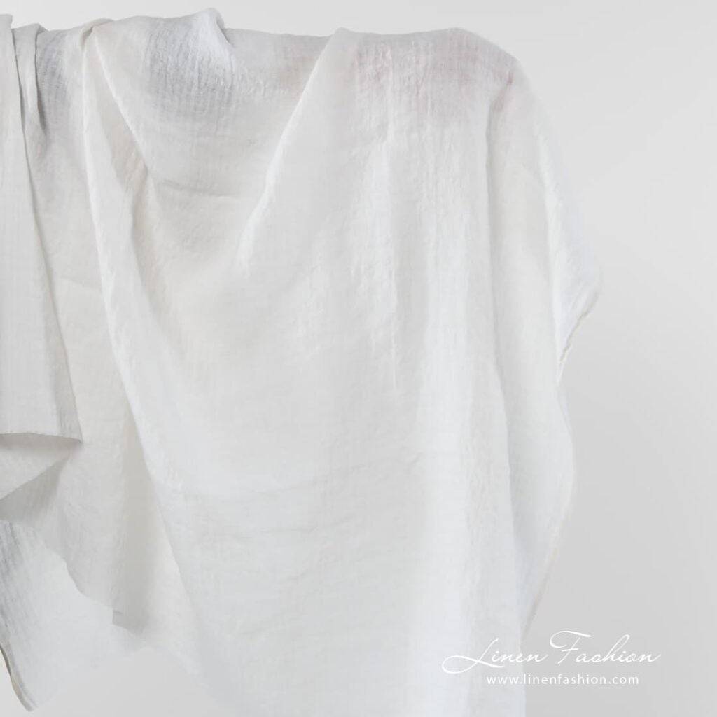 Off white linen fabric with checks.