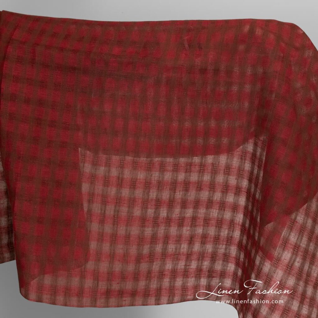 Red linen fabric with brown checks.
