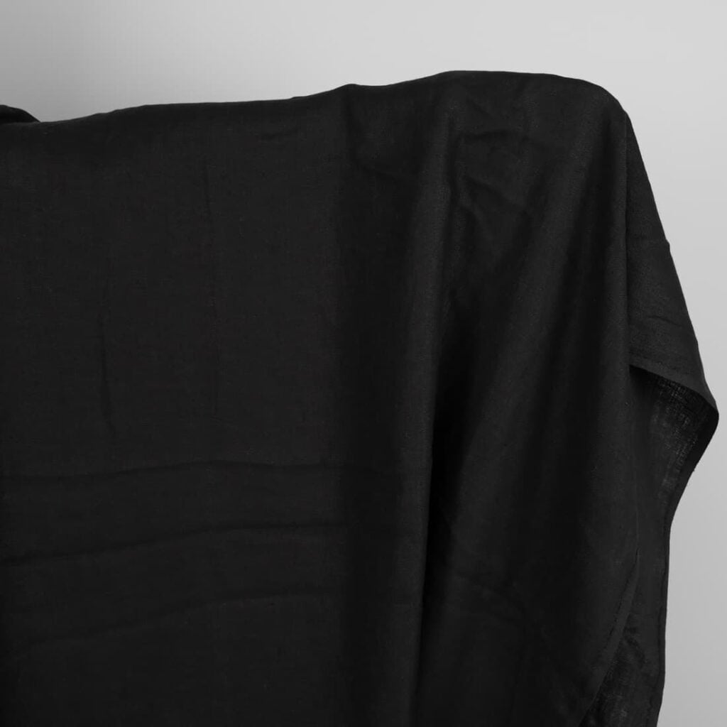 Black washed linen fabric in herringbone