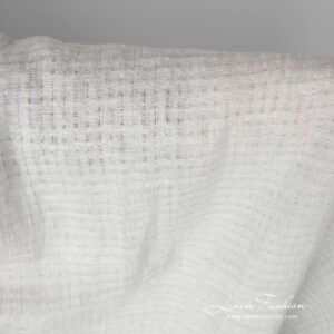Light grey linen fabric with openwork stripes, which forms 1cm x 1cm (0.39”x0.39”) size checks