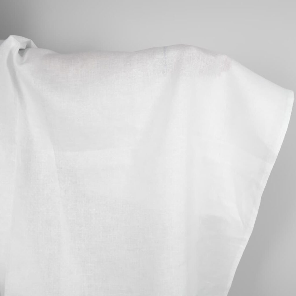 Patterned optical white linen fabric