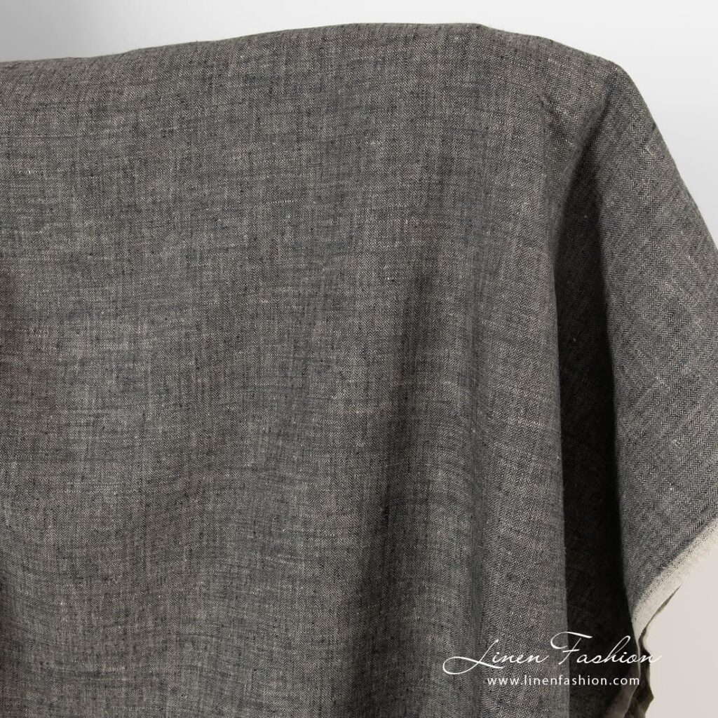 Fiskebeinsmønstret linstoff i svart og naturlig lin 2 100% linen fabric