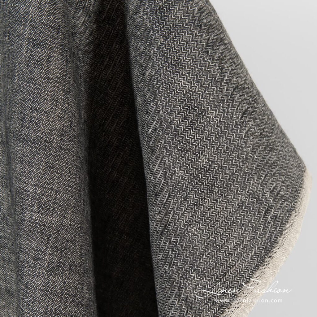 Fiskebeinsmønstret linstoff i svart og naturlig lin 5 Herringbone linen fabric, perfect for clothes and home textile