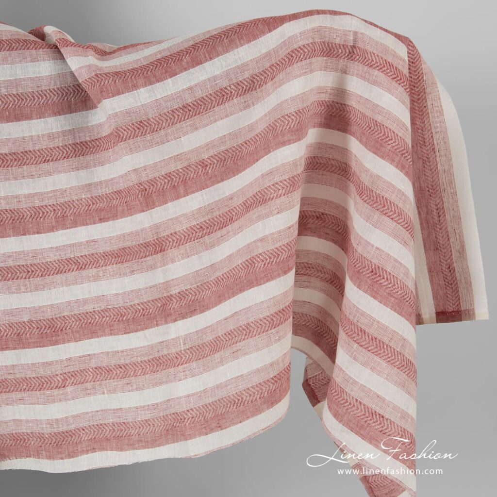 Linen fabric in red and white herringbone stripes