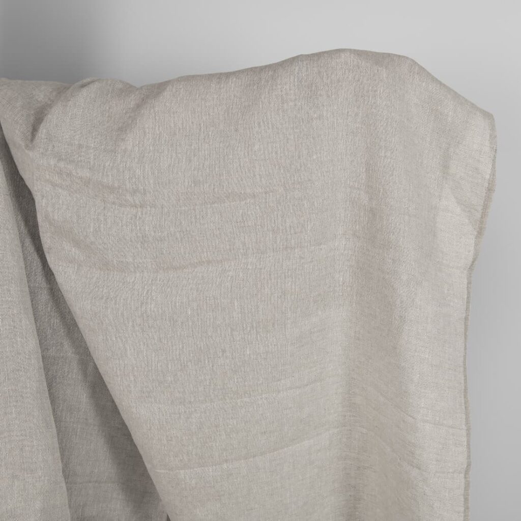 Openwork patterned linen fabric in beige