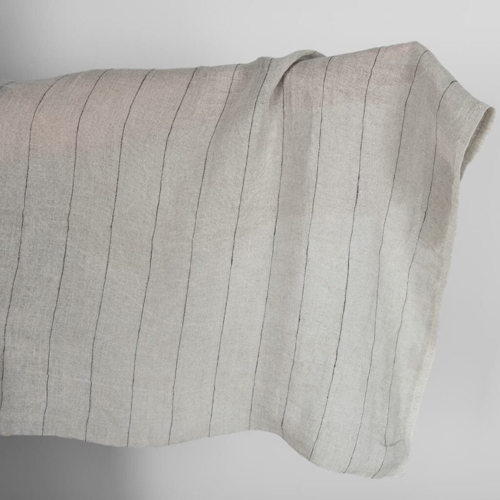 Natural transparent linen fabric with black stripes washed
