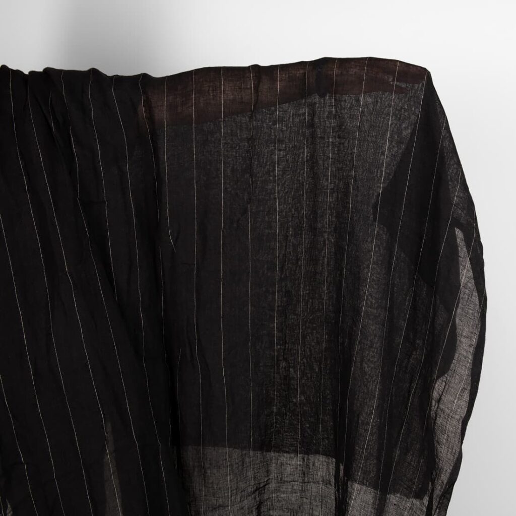 Black transparent linen fabric with grey stripes washed