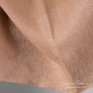 Brunt skinnende linstoff