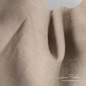 Grått linstoff med gullstriper