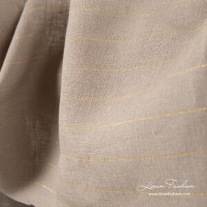 Grått linstoff med gullstriper