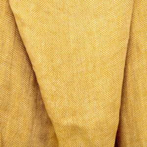 Gult mønstret kyperrutet linstoff vasket