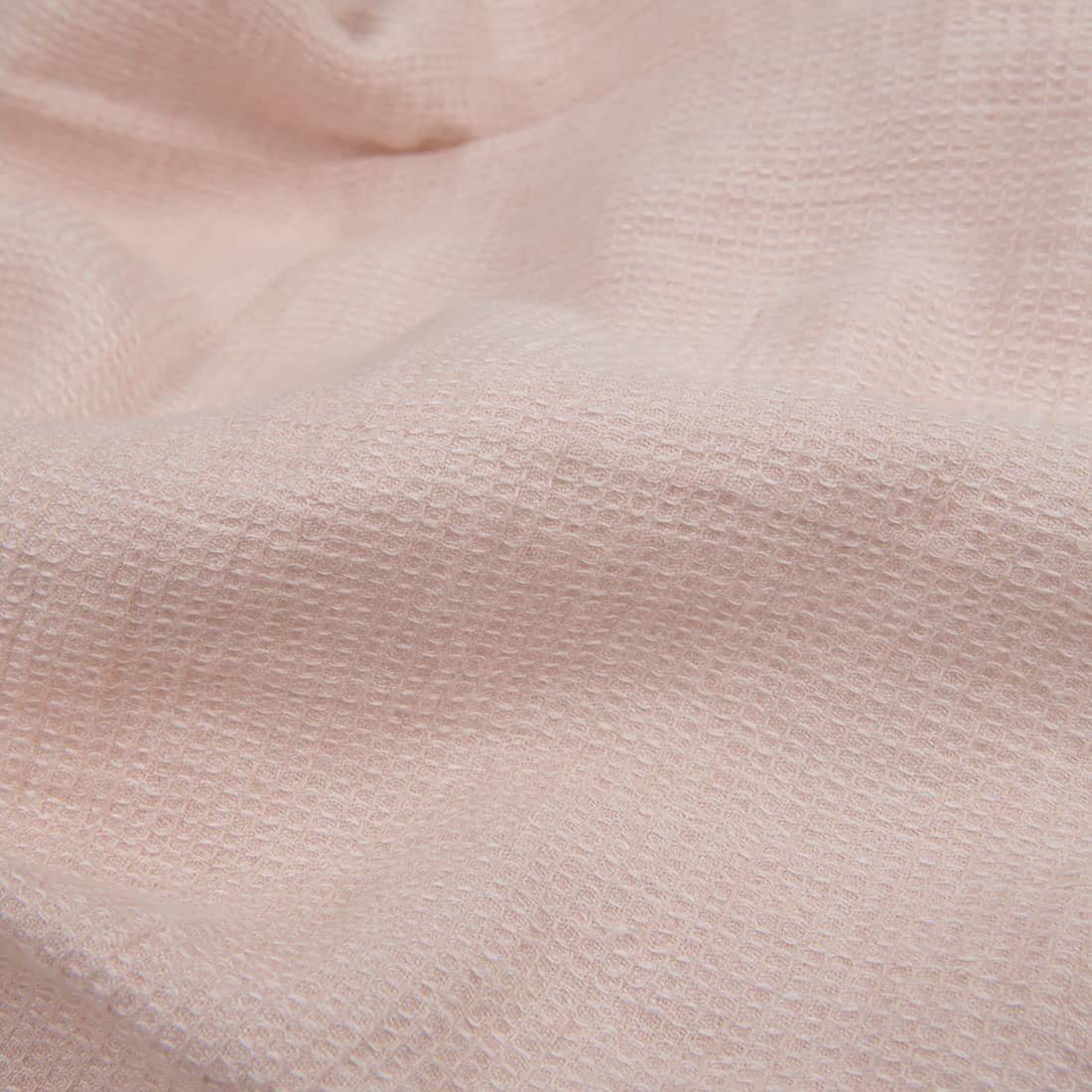 Lys rosa vaffelvevd linstoff vasket