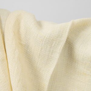 Pale yellow waffle linen fabric washed texture