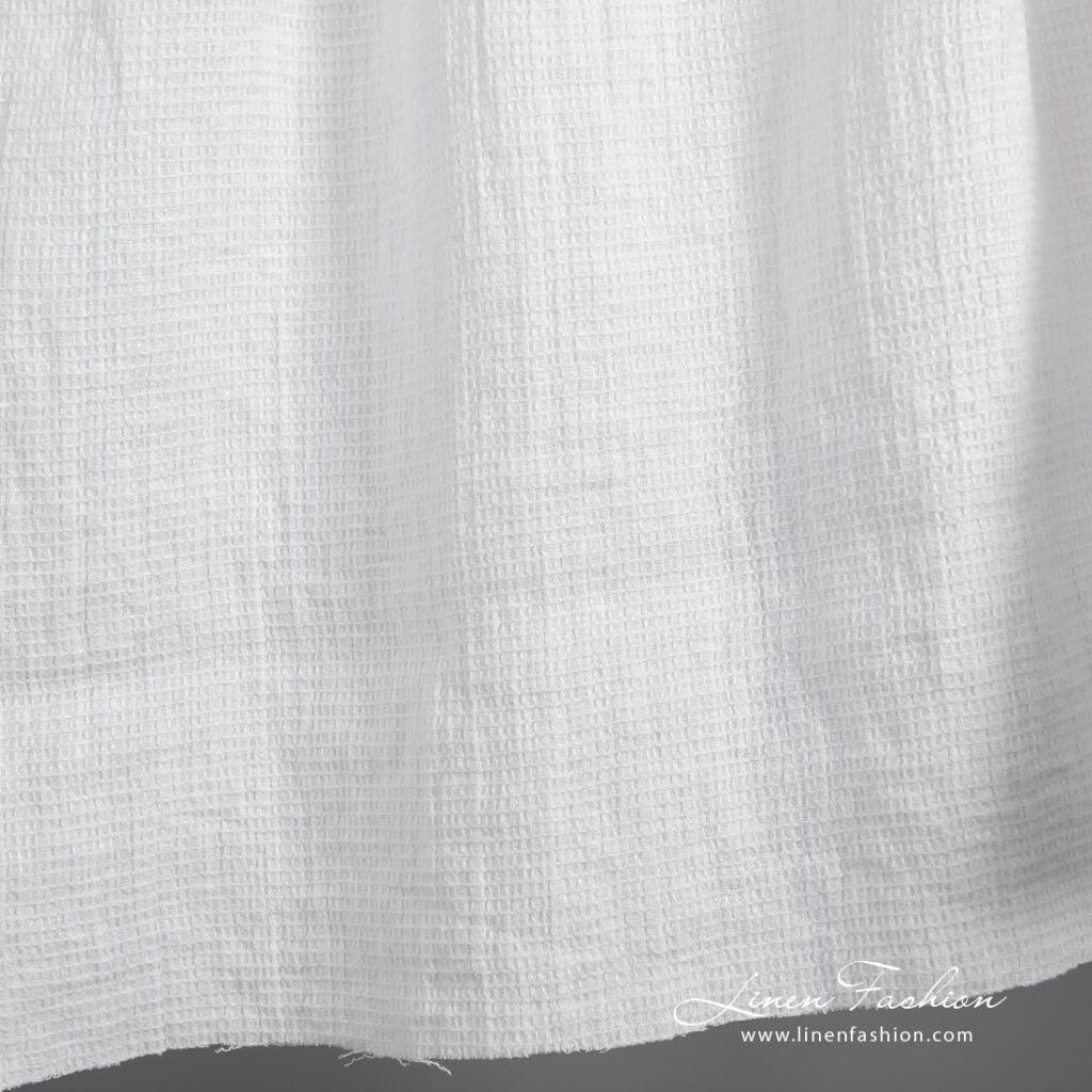 Vasket off-white vaffelvevd linstoff 2 White linen fabric with tiny checks